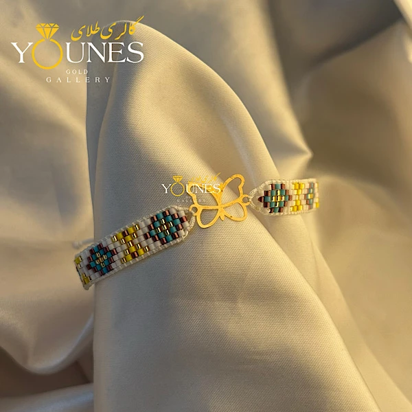 تصویر دوم دستبند میوکی آبی پروانه لیزری طلا